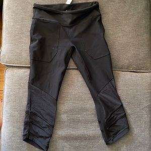 Black Iviva girls leggings. Crop length with net cuff/trim at bottom of leg